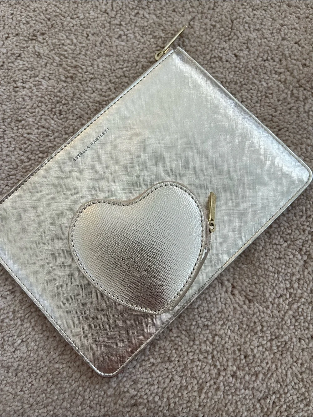 Cutest set of little pouches by Estella Bartlett. Metallic champagne/silver